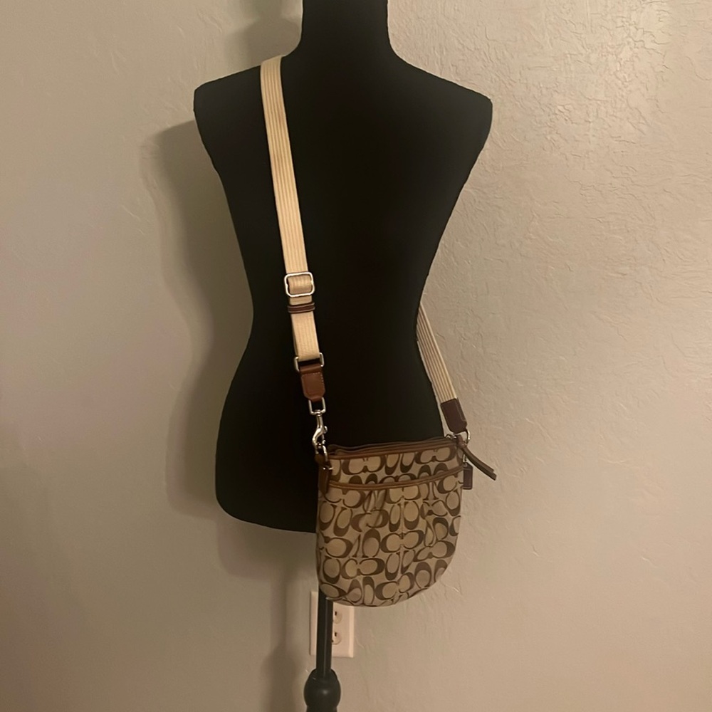 Coach crossbody, brown signature print, brown leather trim, cream strap